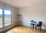 Schlafzimmer mit Ausgang zum Balkon